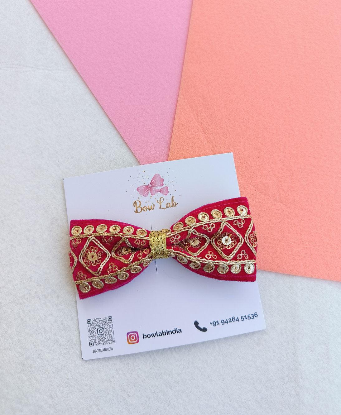 Magenta Festive Bow with Gold Detailing Main image